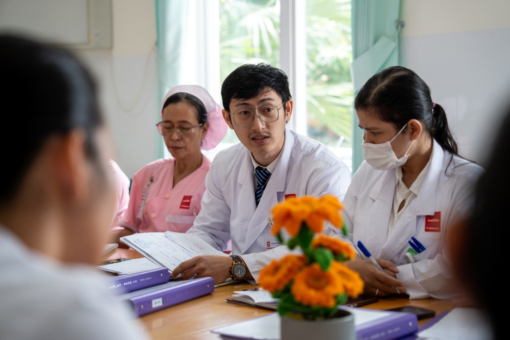Health professional discussing at a table