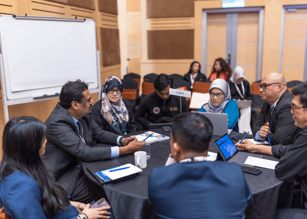 Participants having a discussion at the table