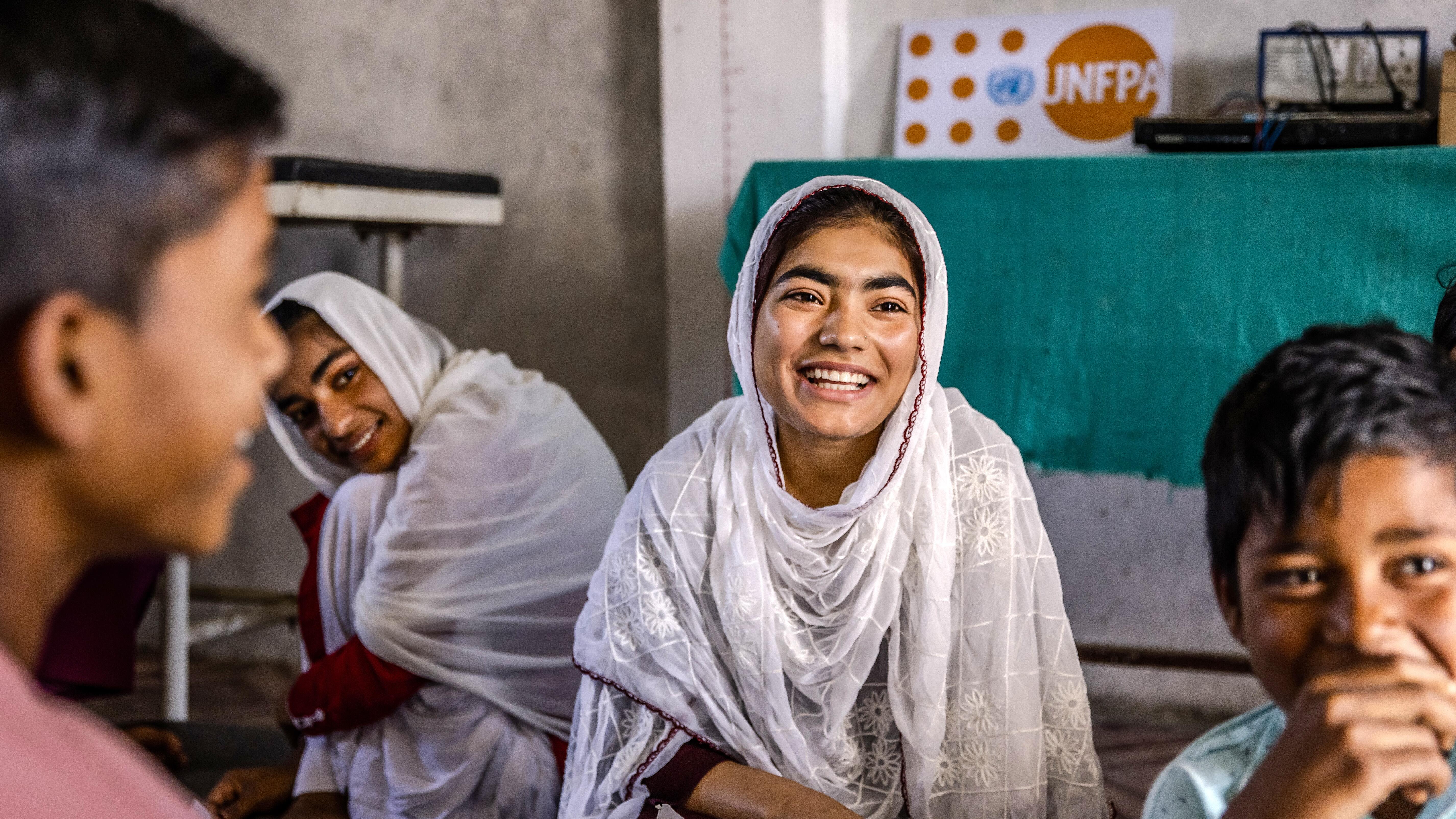 Young people interact during an awareness session at a UNFPA-supported facility in Kapilvastu, Nepal. © UNFPA Nepal/Luis Tato