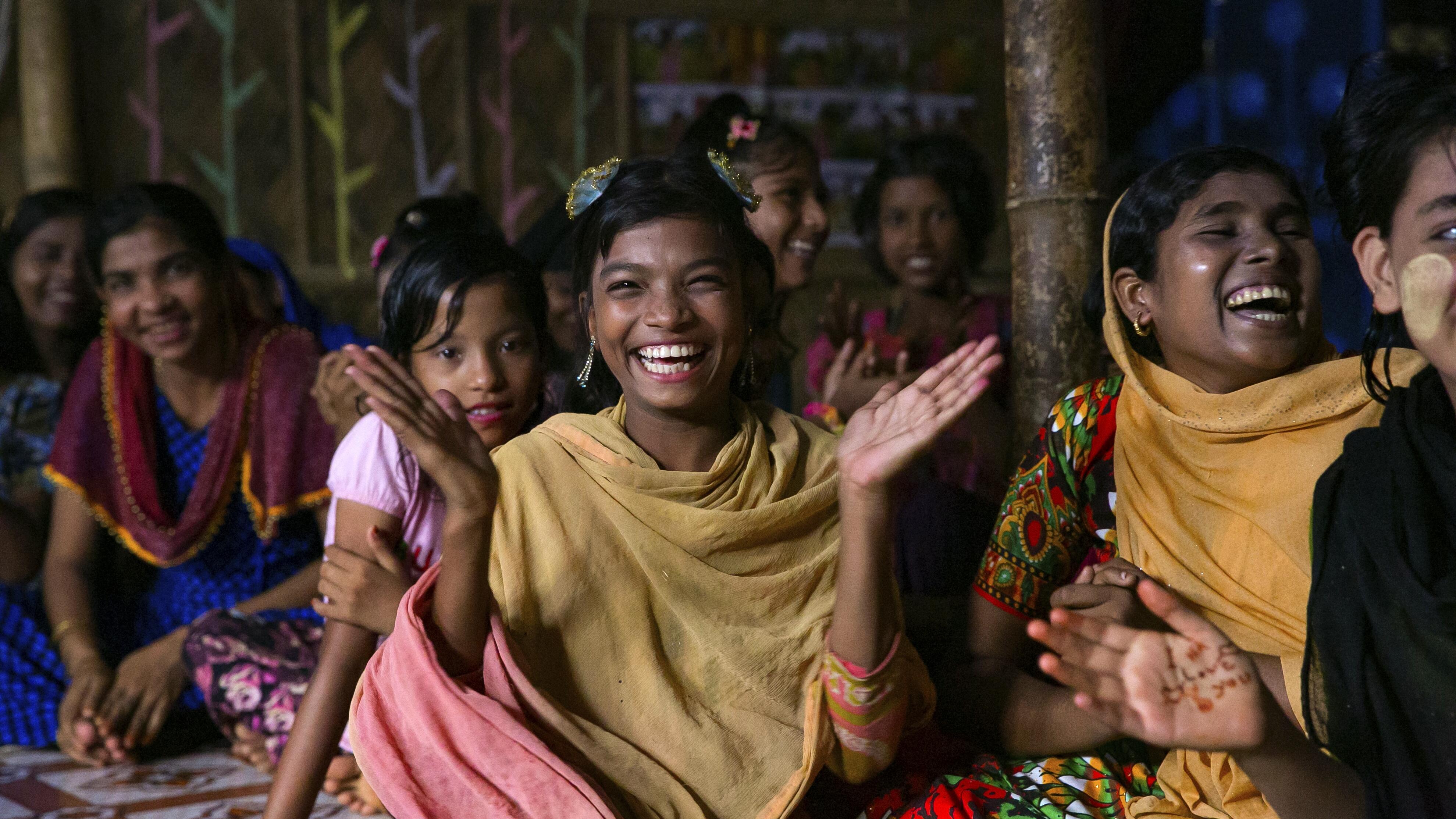 Children take part in a life-skills session at a women-friendly space in a Rohingya refugee camp in Cox’s Bazar, Bangladesh